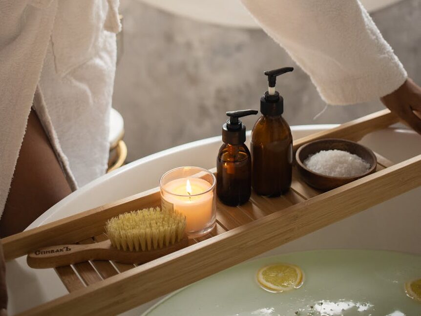 crop woman with tray of spa products